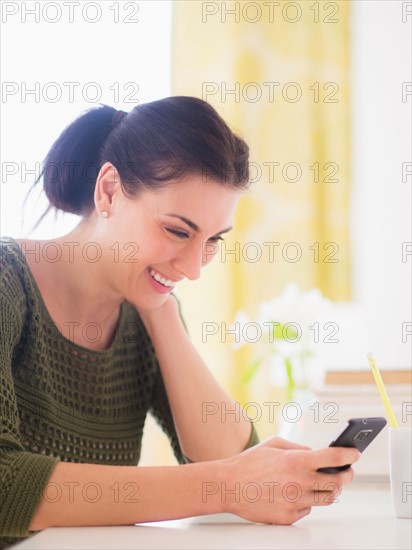 Portrait of woman using mobile phone