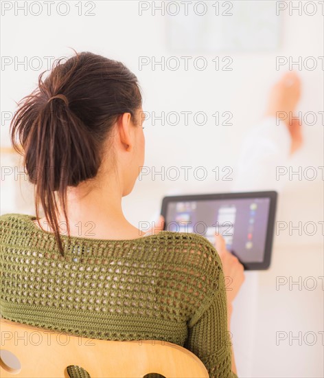 Woman using tablet pc