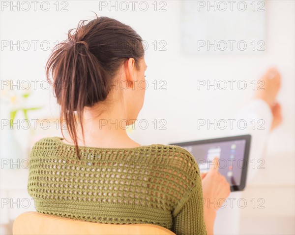 Woman using tablet pc