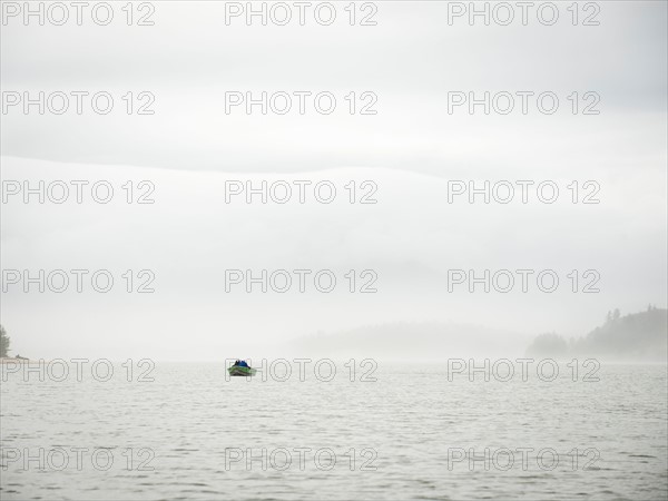 Distant view of people in boat