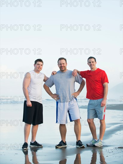 Portrait of men on beach