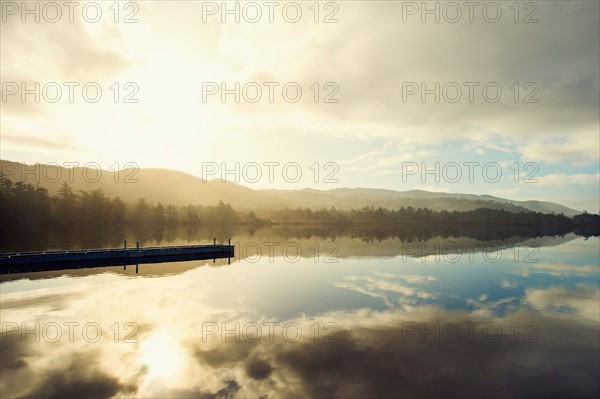 Landscape with sky reflected in water