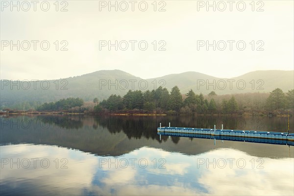 Landscape with sky reflected in water