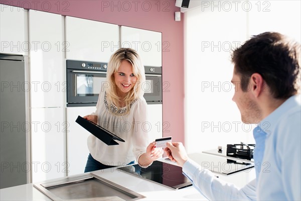 Young couple in kitchen