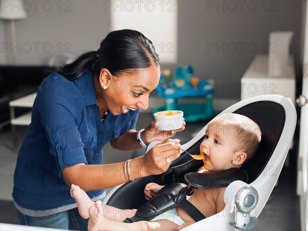 Mother feeding baby (2-5 moths)