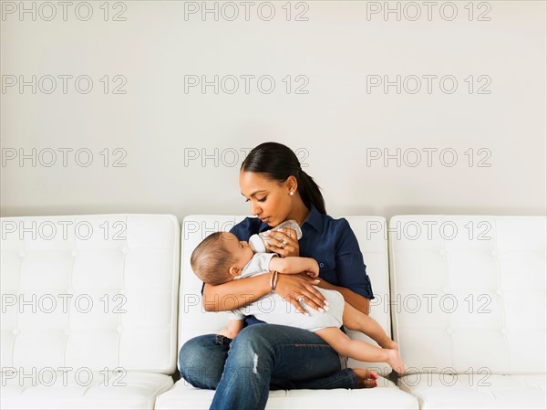 Mother feeding baby (2-5 moths)