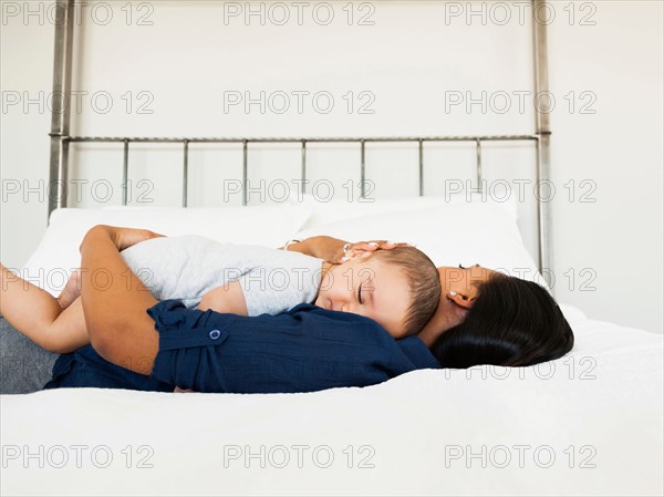 Mother and son (2-5 months) sleeping together