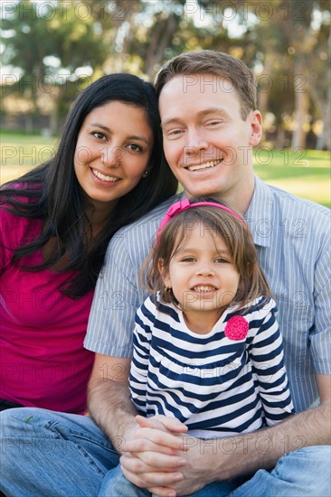 Portrait of happy family in park