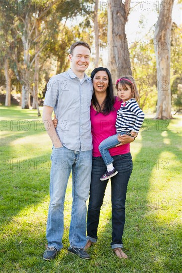 Portrait of happy family in park