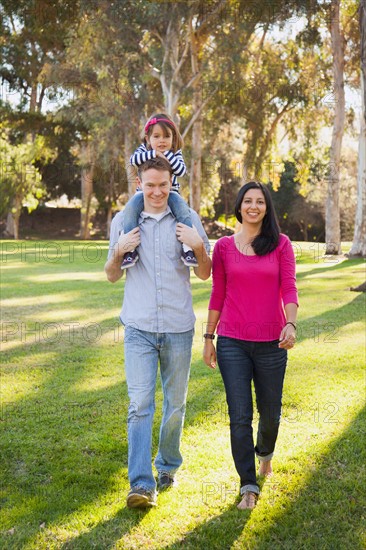 Portrait of happy family in park