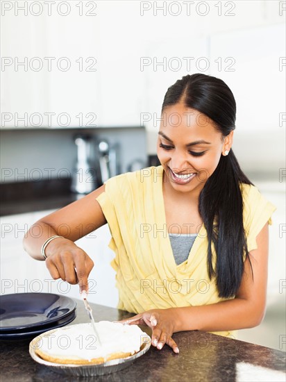 Woman preparing meal in kitchen