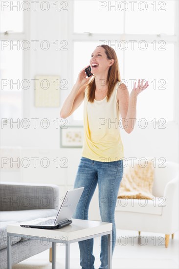 Woman talking on phone.