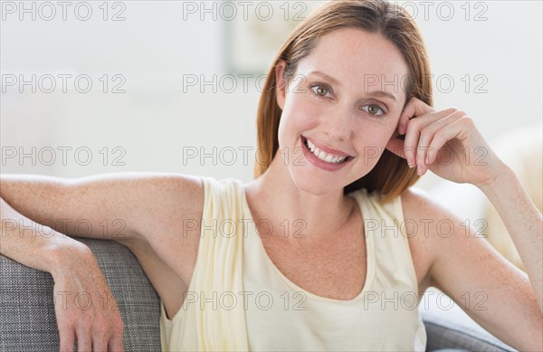 Portrait of young woman smiling.