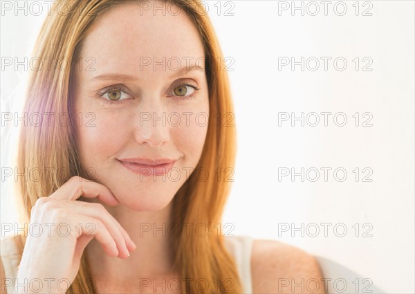 Studio portrait of young woman.