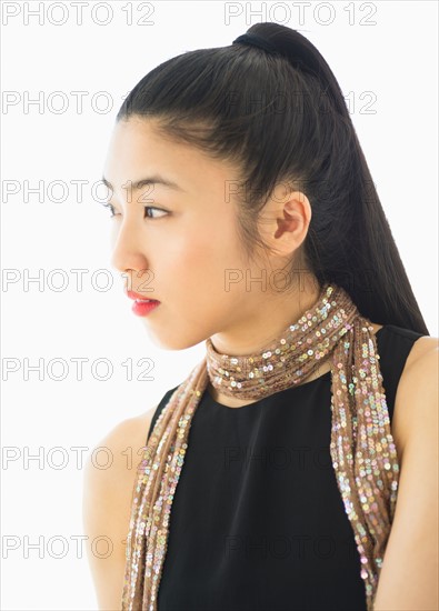 Studio portrait of young woman.