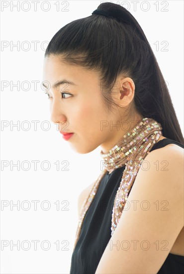 Studio portrait of young woman.