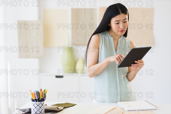 Business woman using tablet pc.