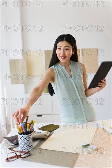 Business woman using tablet pc.