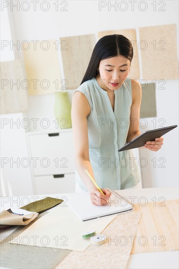 Business woman using tablet pc.