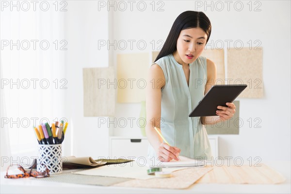 Business woman using tablet pc.