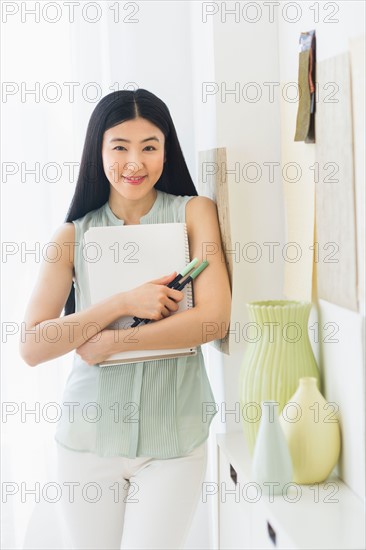 Portrait of business woman in office.