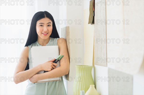 Portrait of business woman in office.