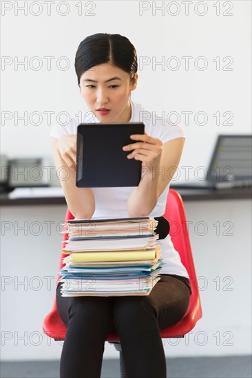 Businesswoman using tablet pc.