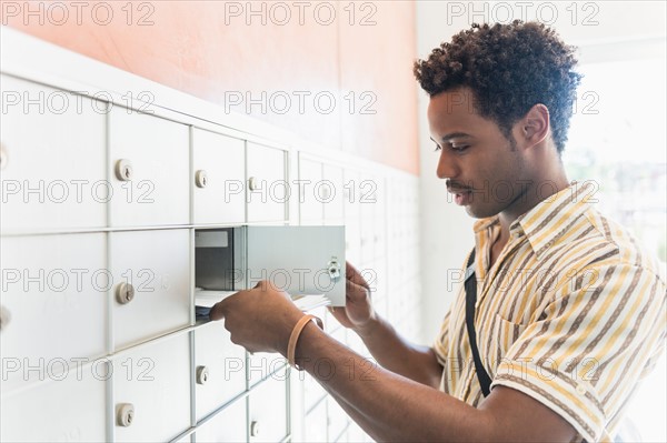 Man checking mailbox.