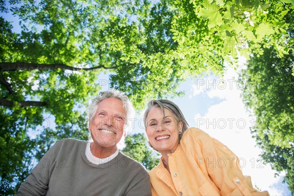 Central Park, New York City. Senior couple under trees.