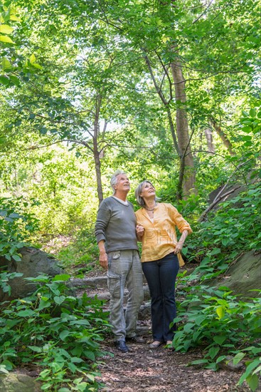 Senior couple relaxing in park.