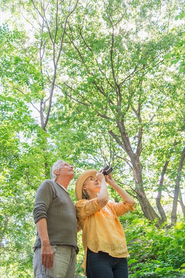 Central Park, New York City. Senior couple in park.