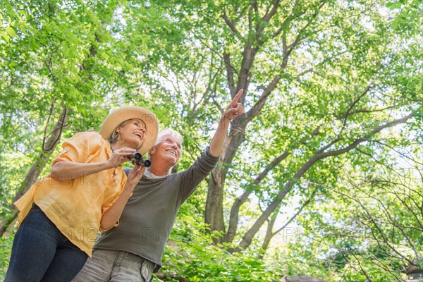 Central Park, New York City. Senior couple in park.