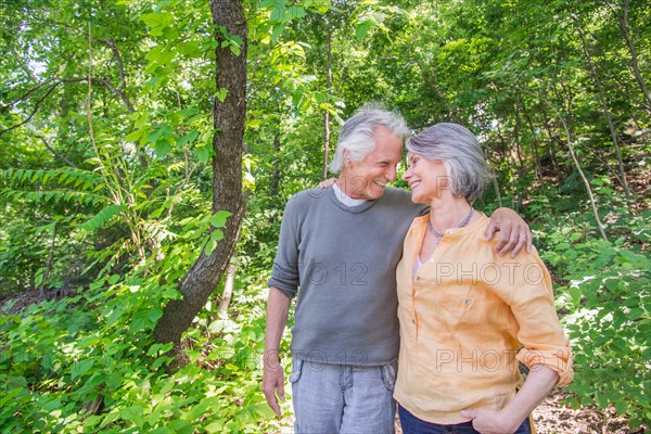 Senior couple relaxing in park.