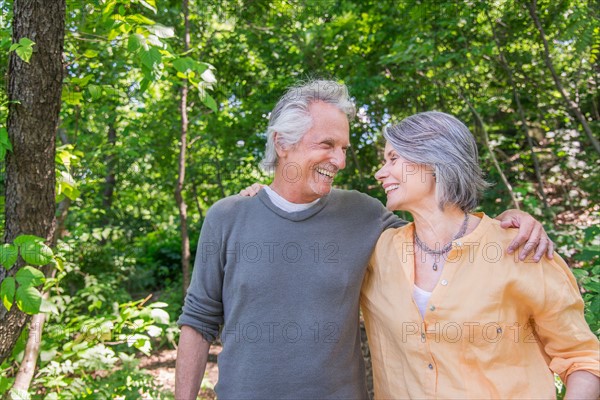 Senior couple relaxing in park.