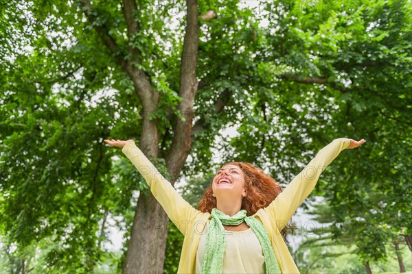 Central Park, New York City. Woman relaxing in park.