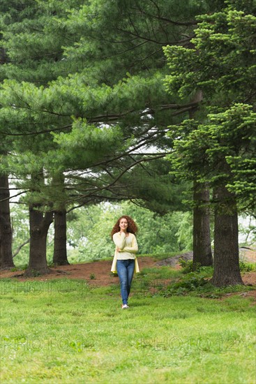 Central Park, New York City. Woman relaxing in park.