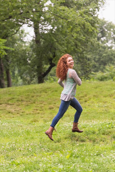 Central Park, New York City. Woman running in park.