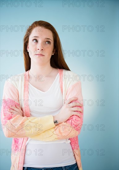 Portrait of teenage girl (14-15), studio shot