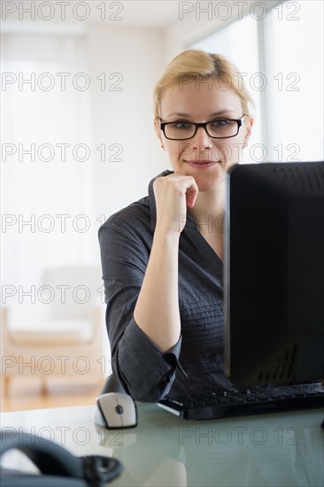 Young businesswoman in office