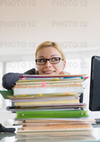 Young woman working at desk in office