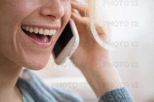 Young woman talking on mobile phone