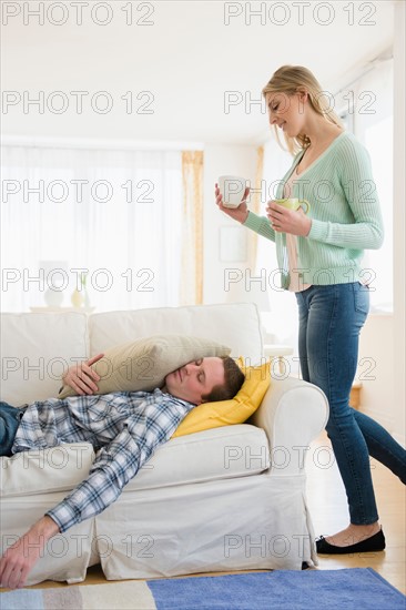 Woman taking car of sick man