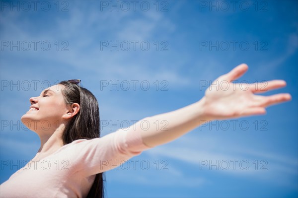 Young woman enjoying sunny weather