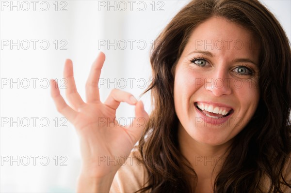 Young woman gesturing