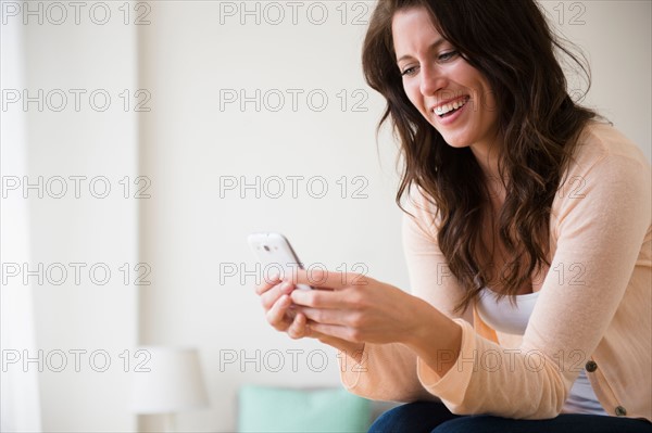 Young woman using mobile phone