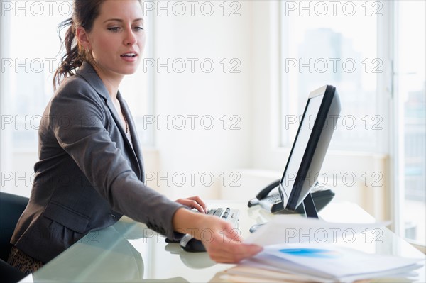 Busy woman in office