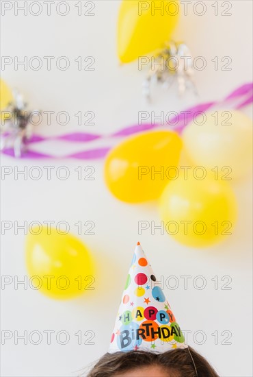 Party hat and balloons