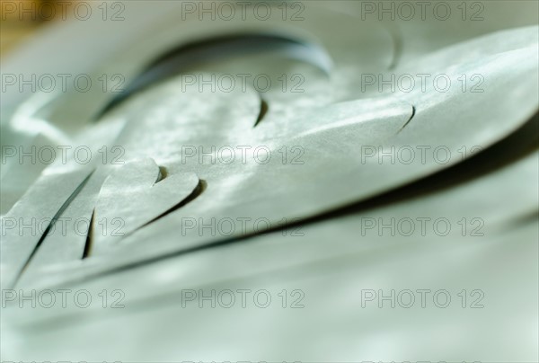 Studio Shot of grey paper heart