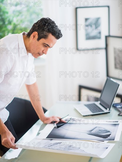 Portrait of man in his photography studio