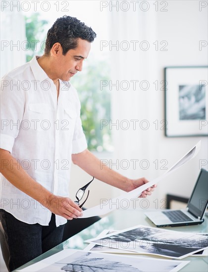 Portrait of man in his photography studio